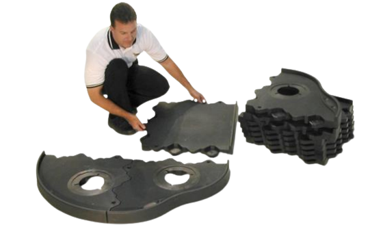 Demonstration of interlocking mini golf underlayment panels with cup openings and stacked sections